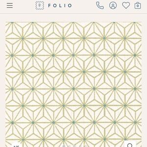 1.5 yards of Folio’s Ulysses Green upholstery fabric in geometric star pattern.